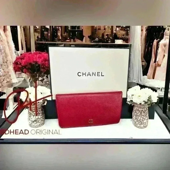 CHANEL Handbags - Gorgeous Chanel red leather bi fold wallet. Condition is rare, comes with box